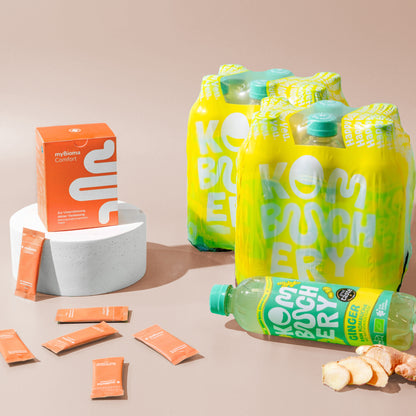 myBioma Comfort neben Flaschen von Kombuchery in der Sorte &quot;Ginger&quot;
